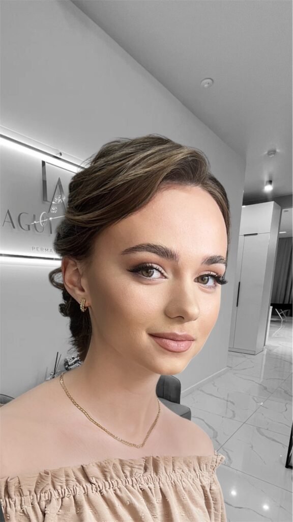 Soft glam event makeup with natural tones and elegant hairstyle in Chicago