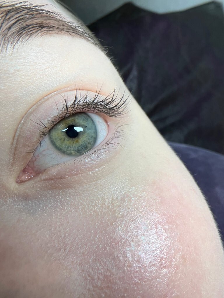 Natural lash lamination result showing a clean lash curve
