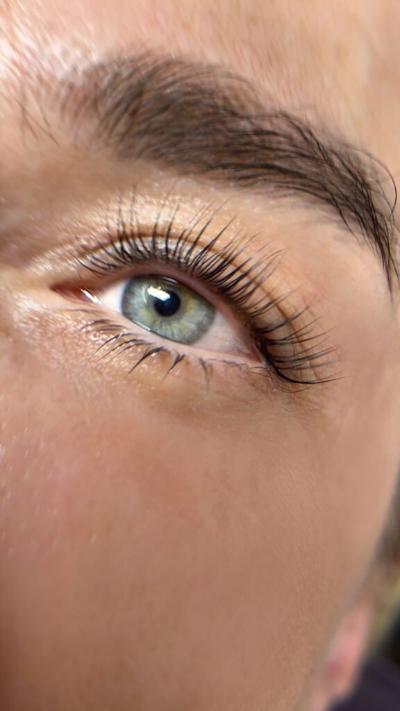 Close-up result of lash lamination and tinting in Buffalo Grove