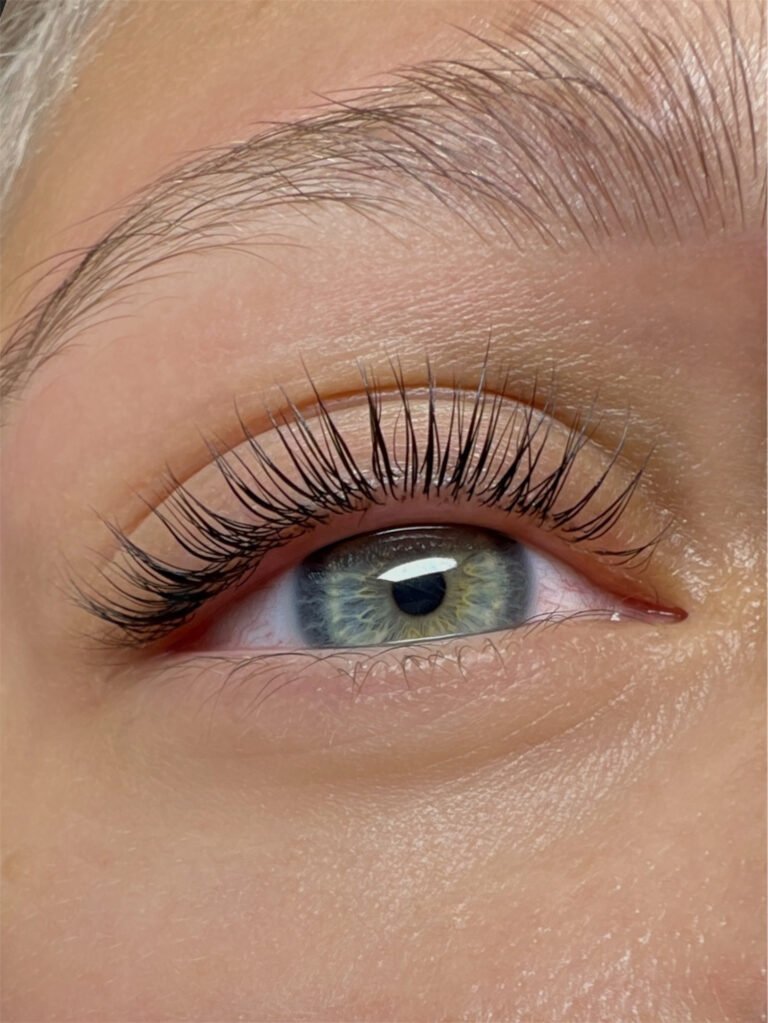 Detailed result of lash and brow lamination with a natural lifted look