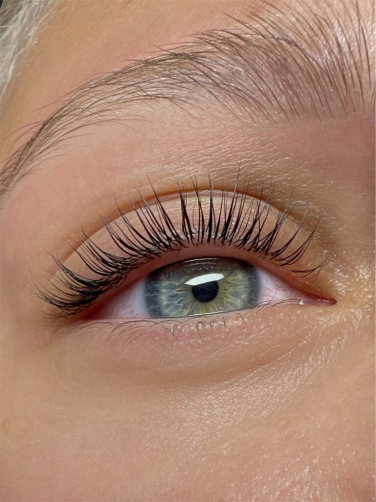 Detailed result of lash and brow lamination with a natural lifted look
