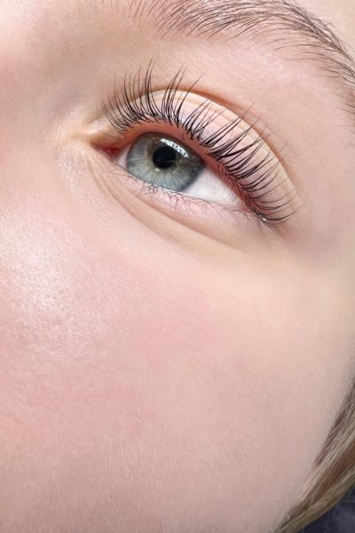 Natural lash lamination close-up with lifted lashes around the eye