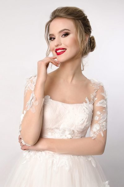 Classic bridal makeup and elegant updo with red lips by ABC Face in Chicago
