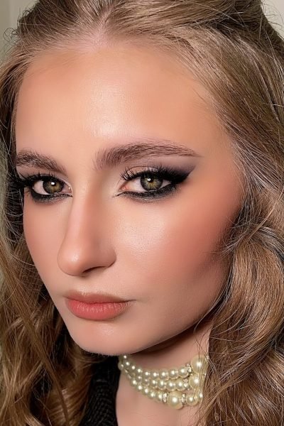 Classic smokey glam event makeup with bold eyes and elegant contour in Chicago