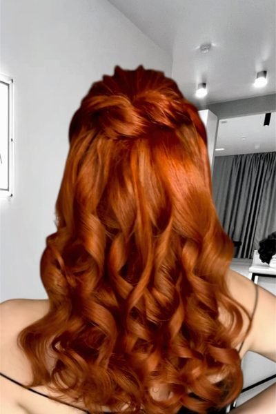 Soft Hollywood waves half-up hairstyle with glossy curls for events and parties in Chicago