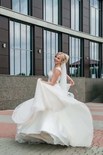 Classic blonde bridal makeup and elegant hairstyle with veil by ABC Face in Chicago